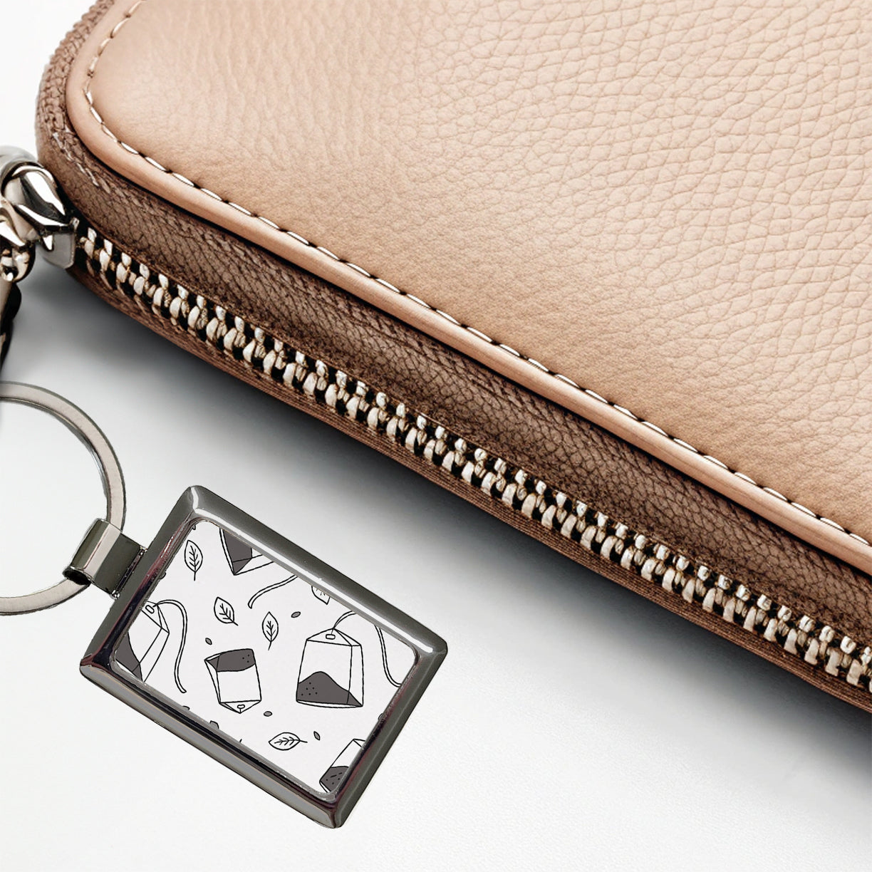 Spinning Tea Bags Rectangle Metal Keychain