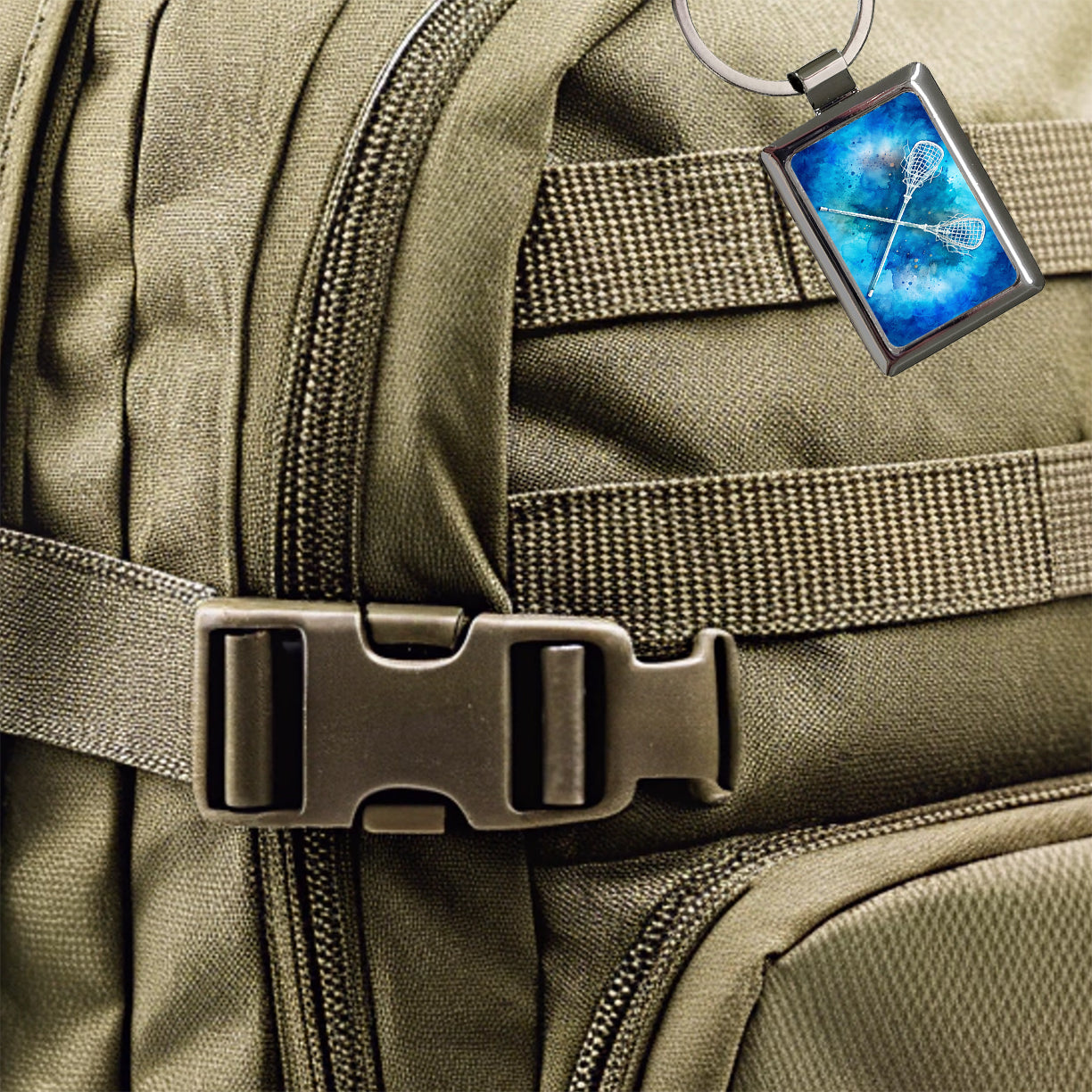 Crossed Lacrosse Sticks On Blue Background Rectangle Metal Keychain