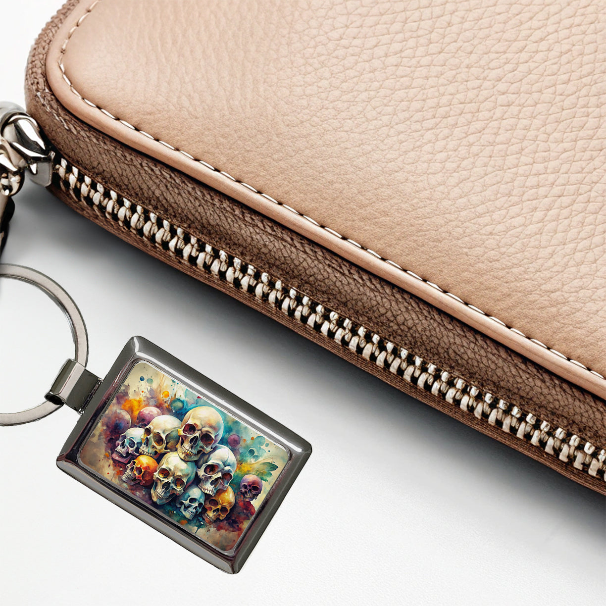 Overlapping Skulls Watercolor Rectangle Metal Keychain