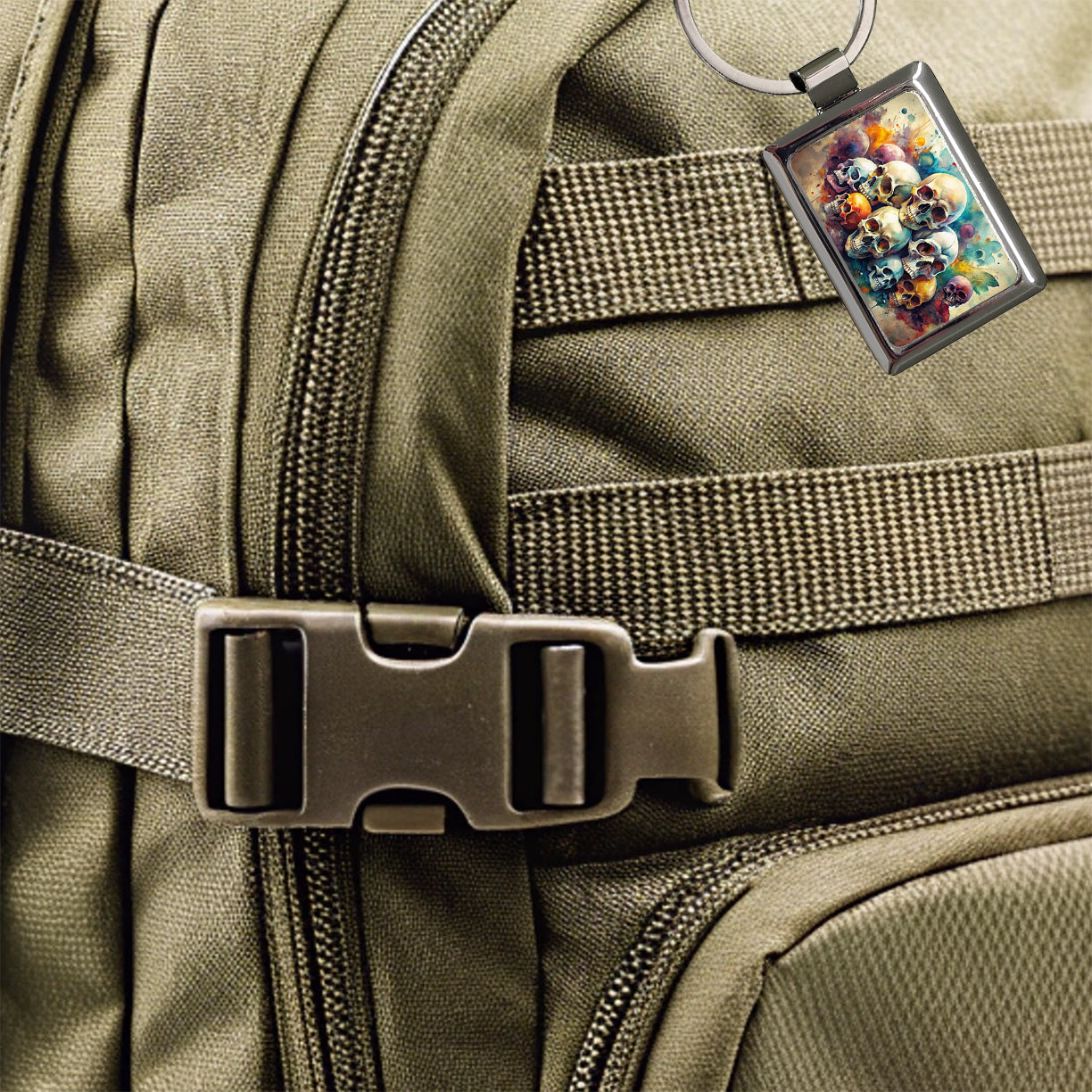 Overlapping Skulls Watercolor Rectangle Metal Keychain