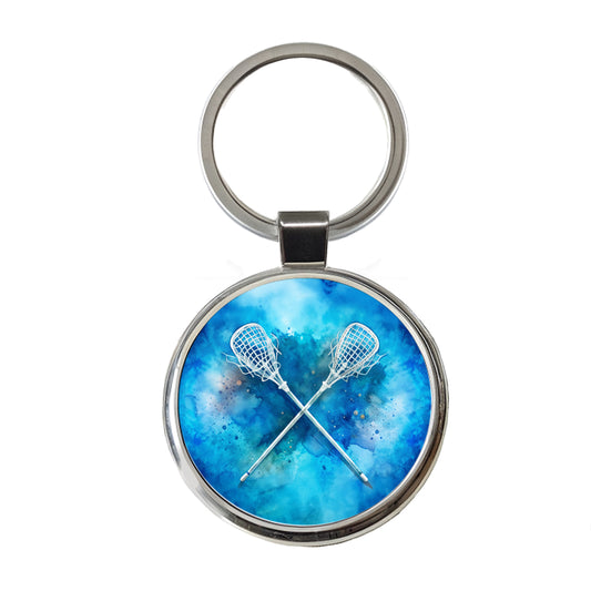Crossed Lacrosse Sticks On Blue Background Round Metal Keychain