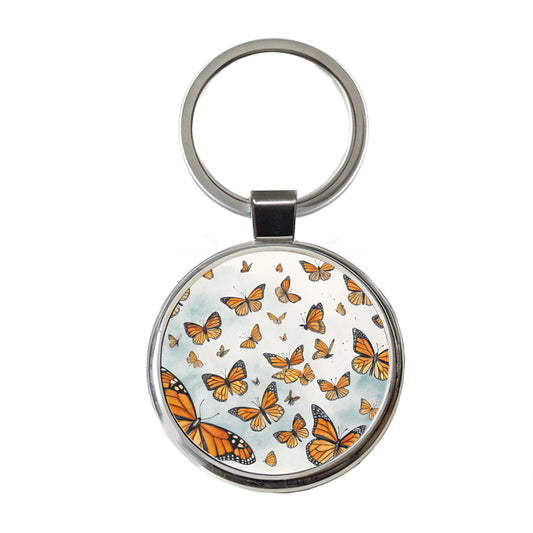 Lots Of Monarch Butterflies in Flight Round Metal Keychain