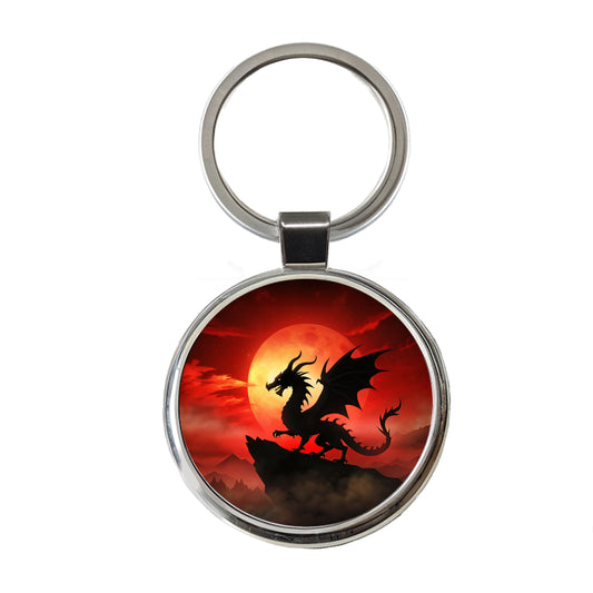 Dragon Silhouette Against A Red Sky Round Metal Keychain