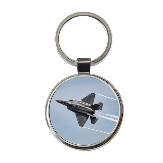 F-35 Plane Afterburners Streaking Through Sky Round Metal Keychain