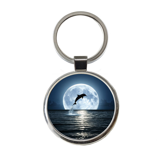 Dolphin Leaping Over Ocean Glowing Moon Round Metal Keychain