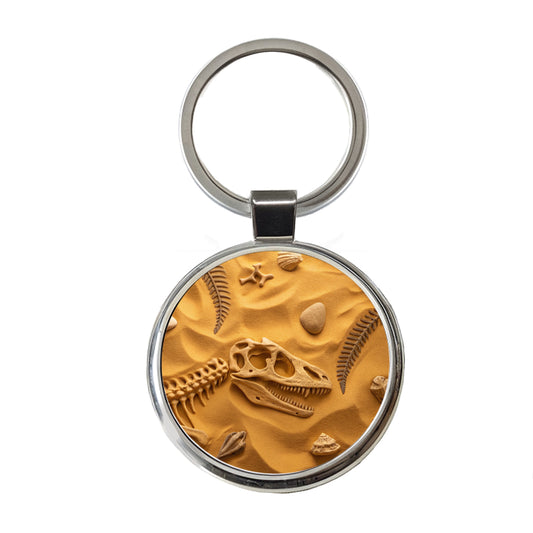 Fossils Dinosaur Bones Scattered On Sand Round Metal Keychain