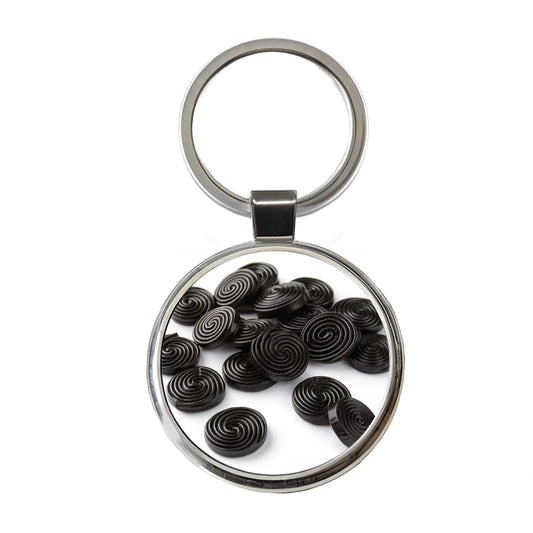 Scattered Black Licorice Round Metal Keychain