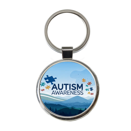 Autism Awareness Flying Puzzle Pieces Round Metal Keychain
