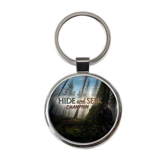 Hide And Seek Champion Big Foot Hiding Round Metal Keychain