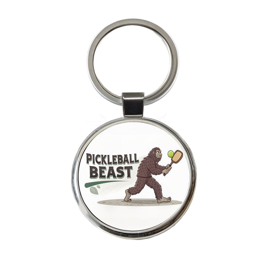 Pickleball Beast Funny Bigfoot Holding Paddle Round Metal Keychain