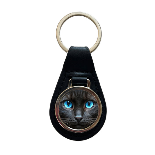 Close-Up Of Blue Cat Eyes Black Leather Metal Keychain