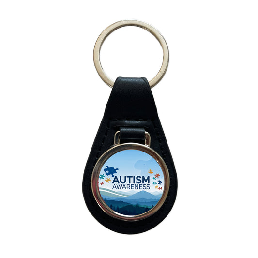 Autism Awareness Flying Puzzle Pieces Black Leather Metal Keychain