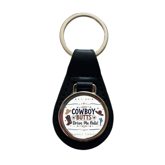 Cowboy Butts Drive Me Nuts Funny Black Leather Metal Keychain