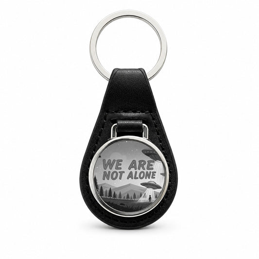We Are Not Alone Funny Retro UFO Black And White Black Leather Metal Keychain
