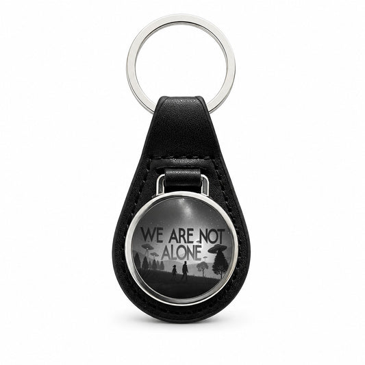 We Are Not Alone Retro Funny Alien Invasion Black Leather Metal Keychain