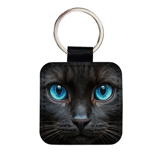 Close-Up Of Blue Cat Eyes Square Faux Leather Keychain