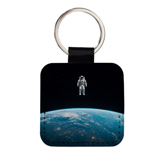 Astronaut Drifting In Space Above Earth Square Faux Leather Keychain