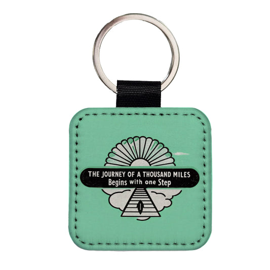 The Journey Of A Thousand Miles Begins With One Step Inspirational Square Faux Leather Keychain