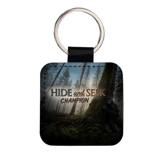 Hide And Seek Champion Big Foot Hiding Square Faux Leather Keychain
