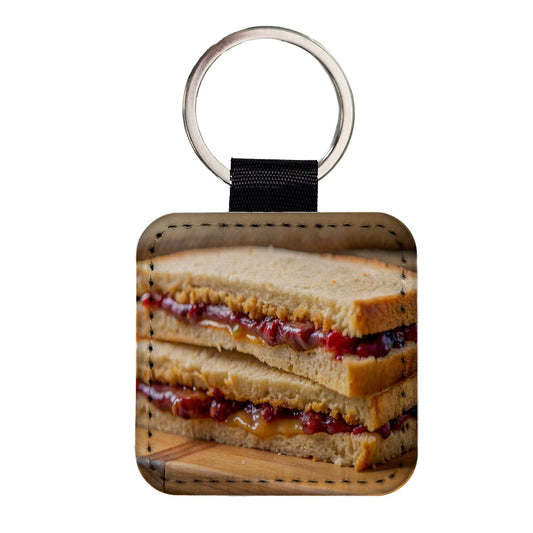 Close-up of a PB&J Peanut Butter And Jelly Sandwich Square Faux Leather Keychain