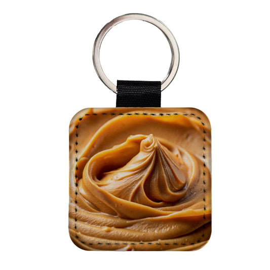 Close-up of Creamy Peanut Butter Square Faux Leather Keychain