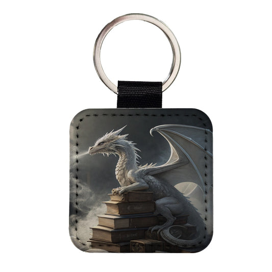 Misty Dragon Sitting On Books Square Faux Leather Keychain