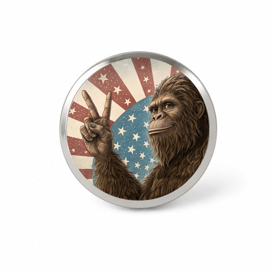 Bigfoot Giving Peace Sign Rising American Flag Novelty Hat Backpack Lapel Pin