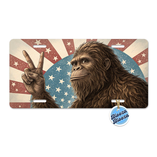 Bigfoot Giving Peace Sign Rising American Flag Metal Vanity Novelty Tag License Plate for Trucks Cars SUVs